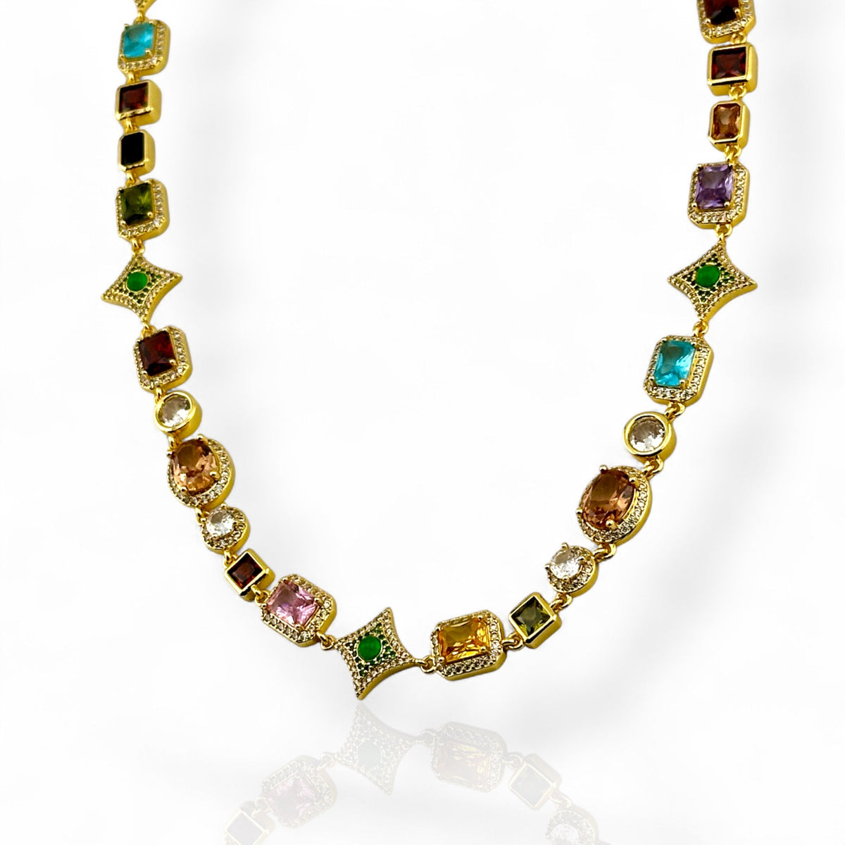 HAYES CARROLL gold-tone necklace featuring multi-colored 10mm gemstones, star-shaped links, and crystal halos.